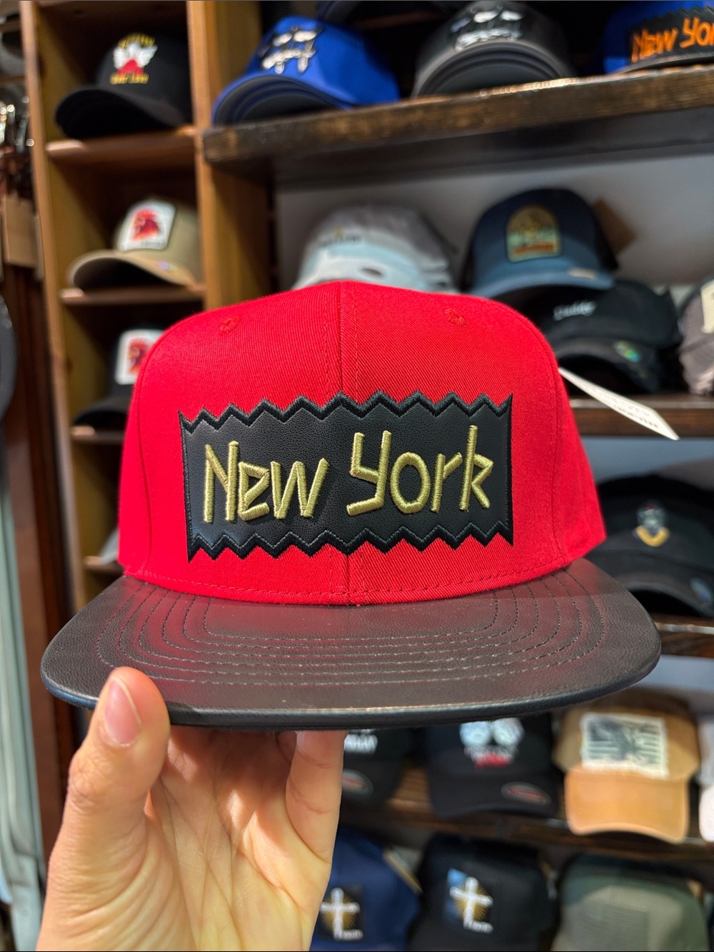 Red 'New York' Patch Snapback Hat with Black Brim